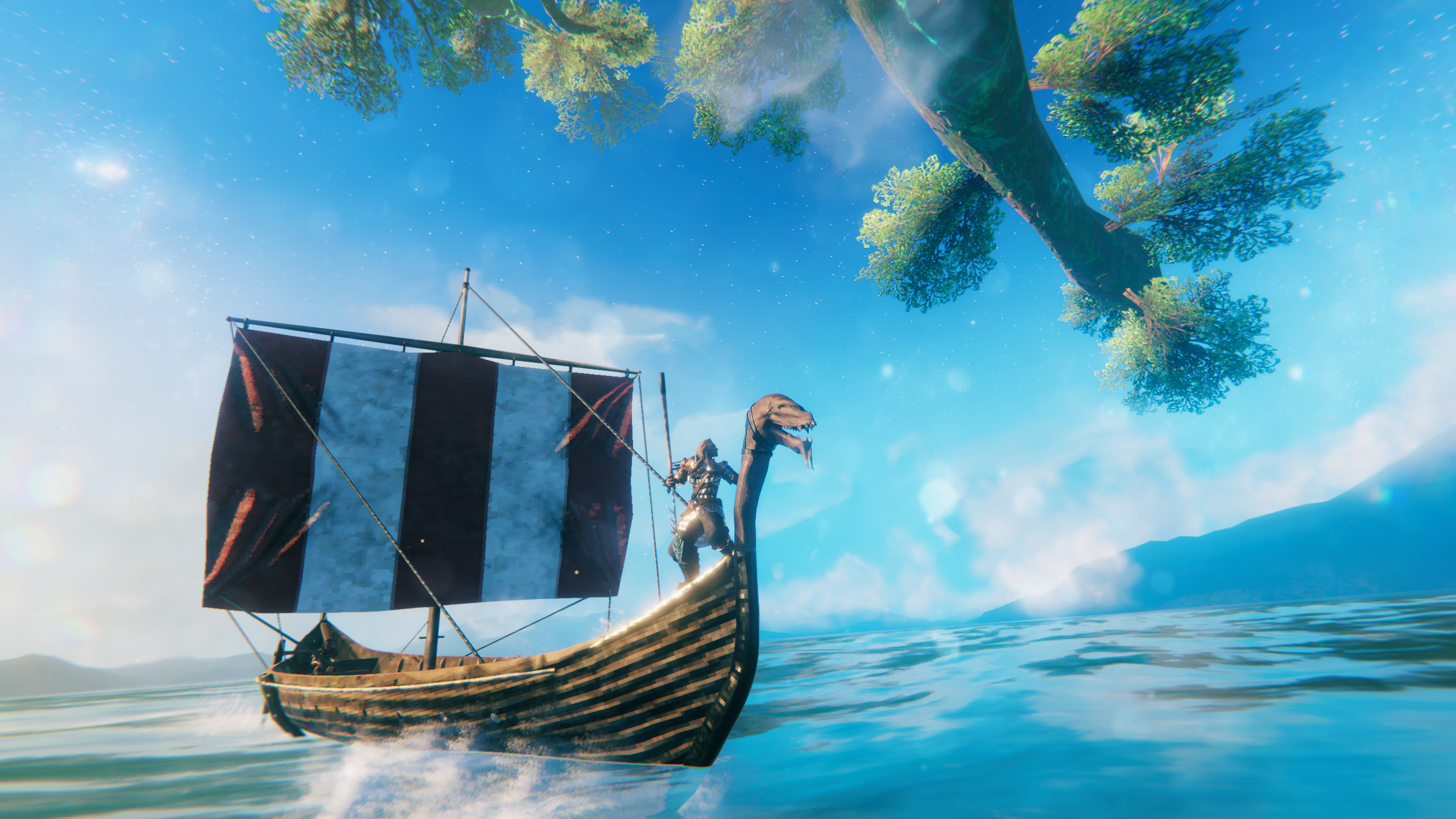 Ett vikingaskepp som åker på ett hav i en spelmiljö